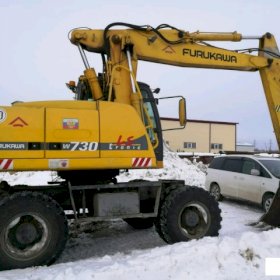 Аренда Экскаватор колесный с гидромолотом